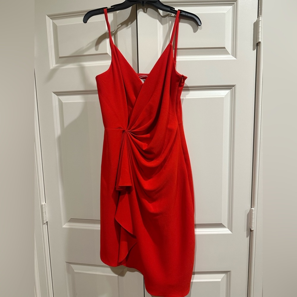 Beautiful red crepe asymmetrical strappy dress .  Fully lined - from Neimans !